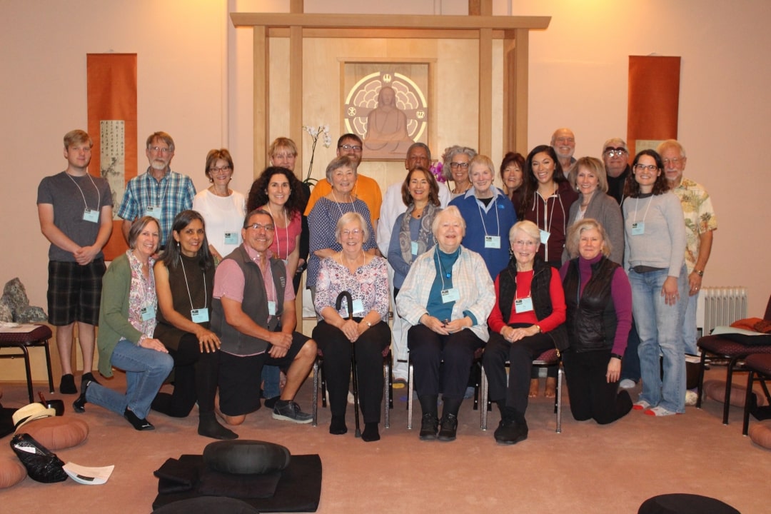 Group of people indoors posing for a photo at Mercy Center Centering Prayer Retreat 2018